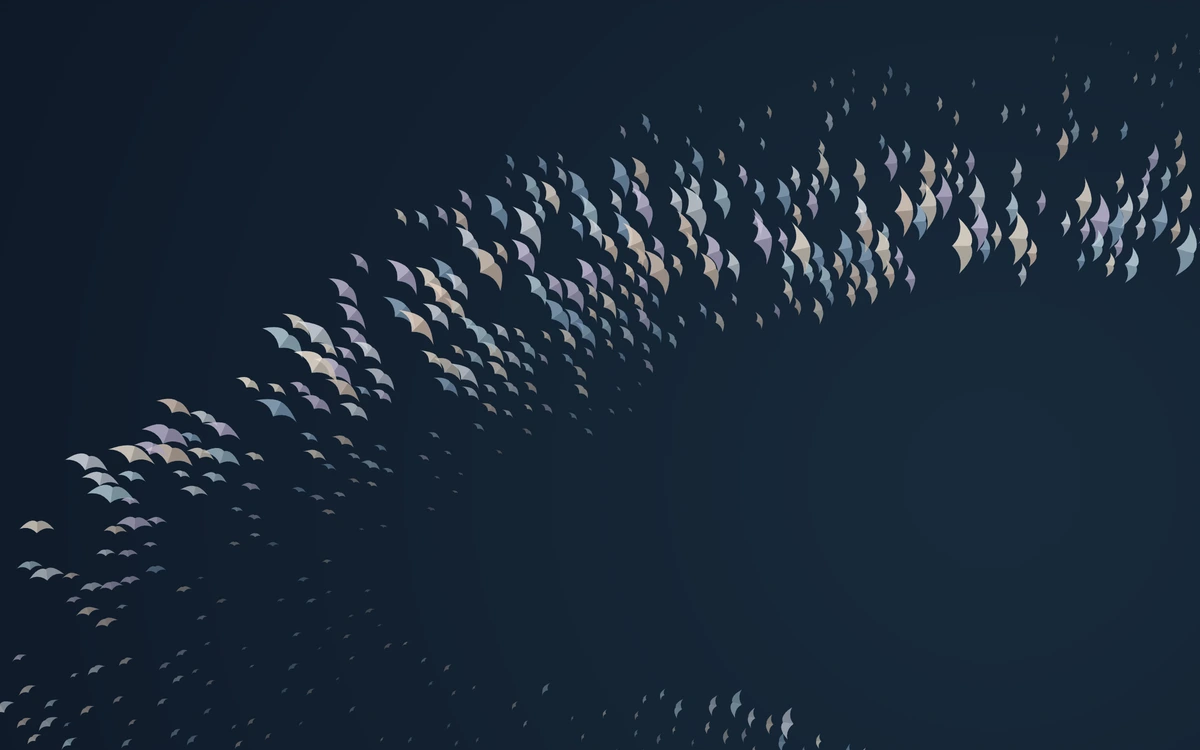 A close view of pearl, blue, and lavender folded wings sweeping diagonally across a dark sky